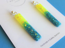 Load image into Gallery viewer, GLITTER STICKS - Neon Yellow and Blue Dangle with silver ball top
