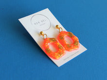 Load image into Gallery viewer, Random Resin - Neon Orange and Gold Glitter Dangle with gold ball top
